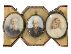 Three oval portrait miniatures, one with easel frame and one cased.