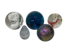 Collection of five glass paperweights including iridescent by Paul C Brown 1992.