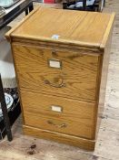 Pair golden oak two drawer filing cabinets, 71.5cm by 48cm by 43cm.