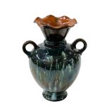 Linthorpe Pottery mottled glazed two ring handled vase, shape number 2207, 18.5cm.