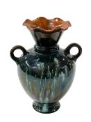 Linthorpe Pottery mottled glazed two ring handled vase, shape number 2207, 18.5cm.