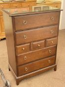 Stag Minstrel chest of four long and three short drawers, 112cm by 82cm by 46.5cm.