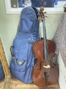 Cased Cello with bow and accessories.