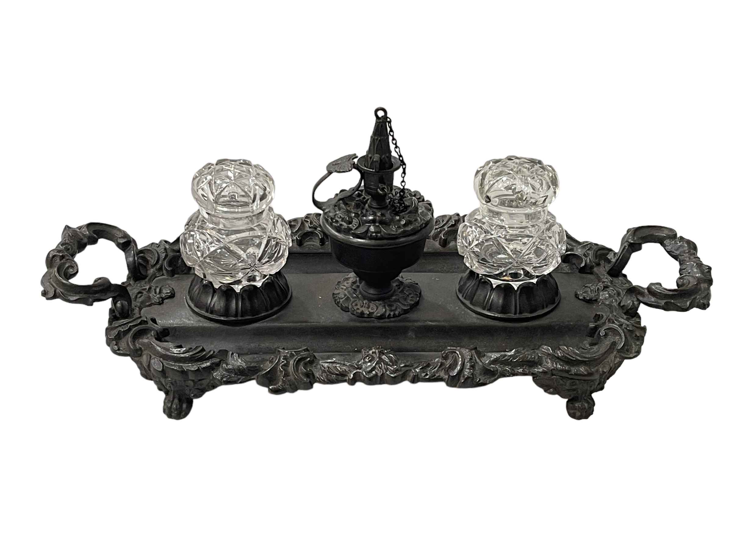 Victorian cast metal ornate inkstand with bottles, 36cm across.