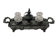 Victorian cast metal ornate inkstand with bottles, 36cm across.