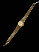 Ladies Omega 9 carat gold bracelet watch.