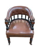 Victorian turned leg club chair in brown hide.