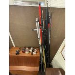 Collection of fishing rods and five reels.