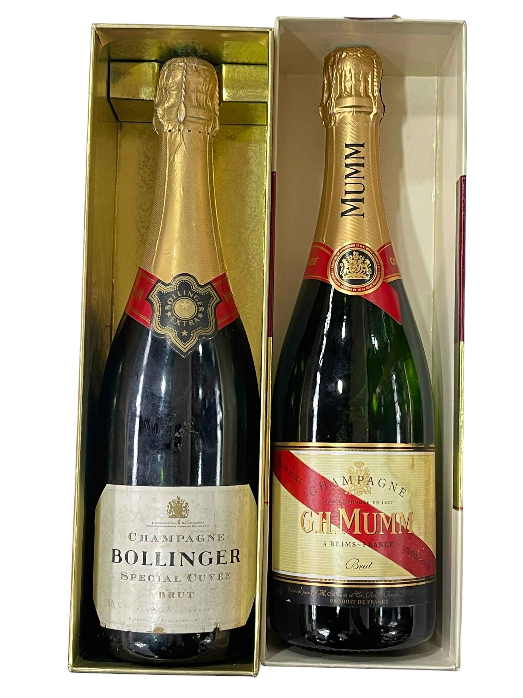 Two bottles of champagne, Bolinger and Mumm.