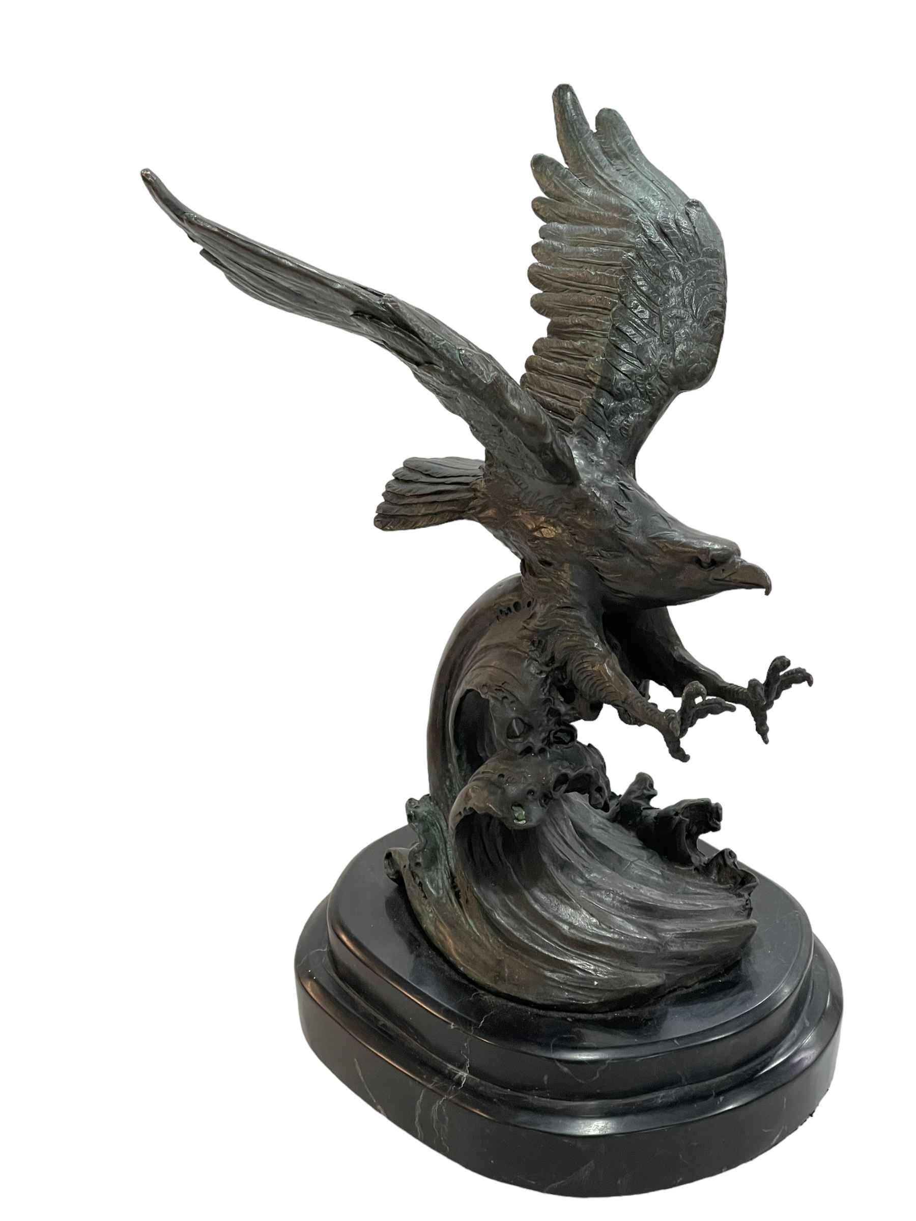 Bronze figure of a Swooping Eagle on marble base, 31.5cm.