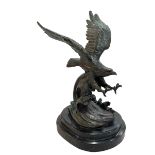 Bronze figure of a Swooping Eagle on marble base, 31.5cm.