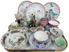 Collection of Oriental porcelain including set of three plates, figures, ginger jar, dishes, bowls,