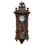 Victorian walnut cased double weight Vienna wall clock with enamelled dial.