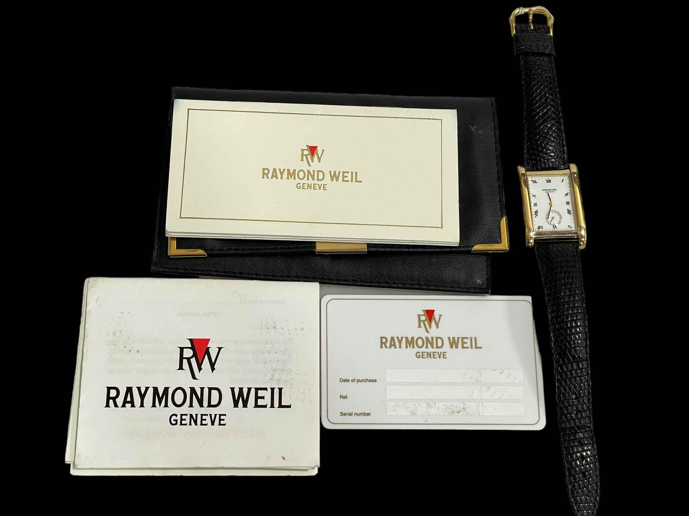 Raymond Weil tank style 18 carat gold plated wristwatch with papers.