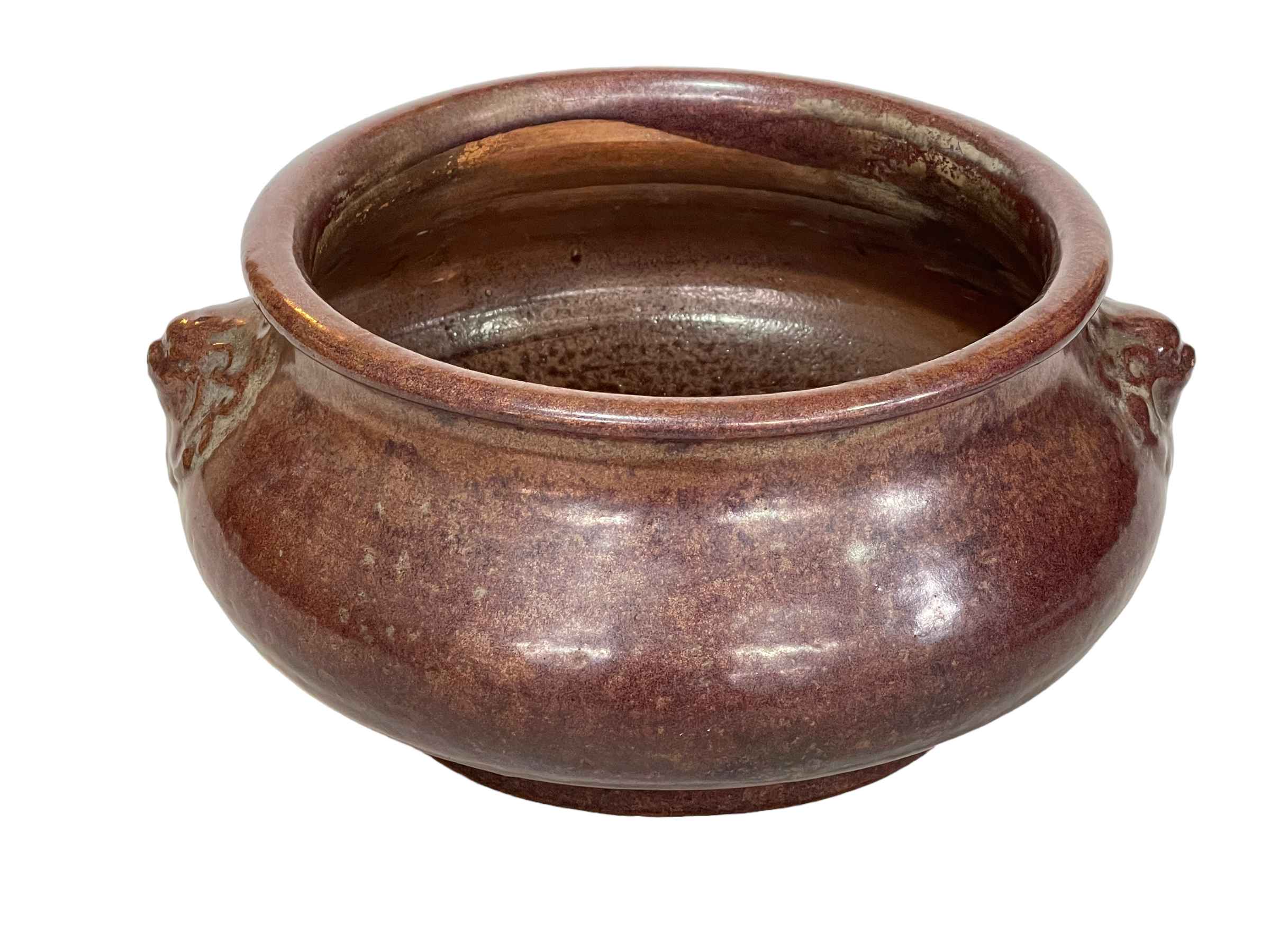 Chinese plum glazed stoneware bowl, 25cm diameter.