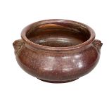 Chinese plum glazed stoneware bowl, 25cm diameter.