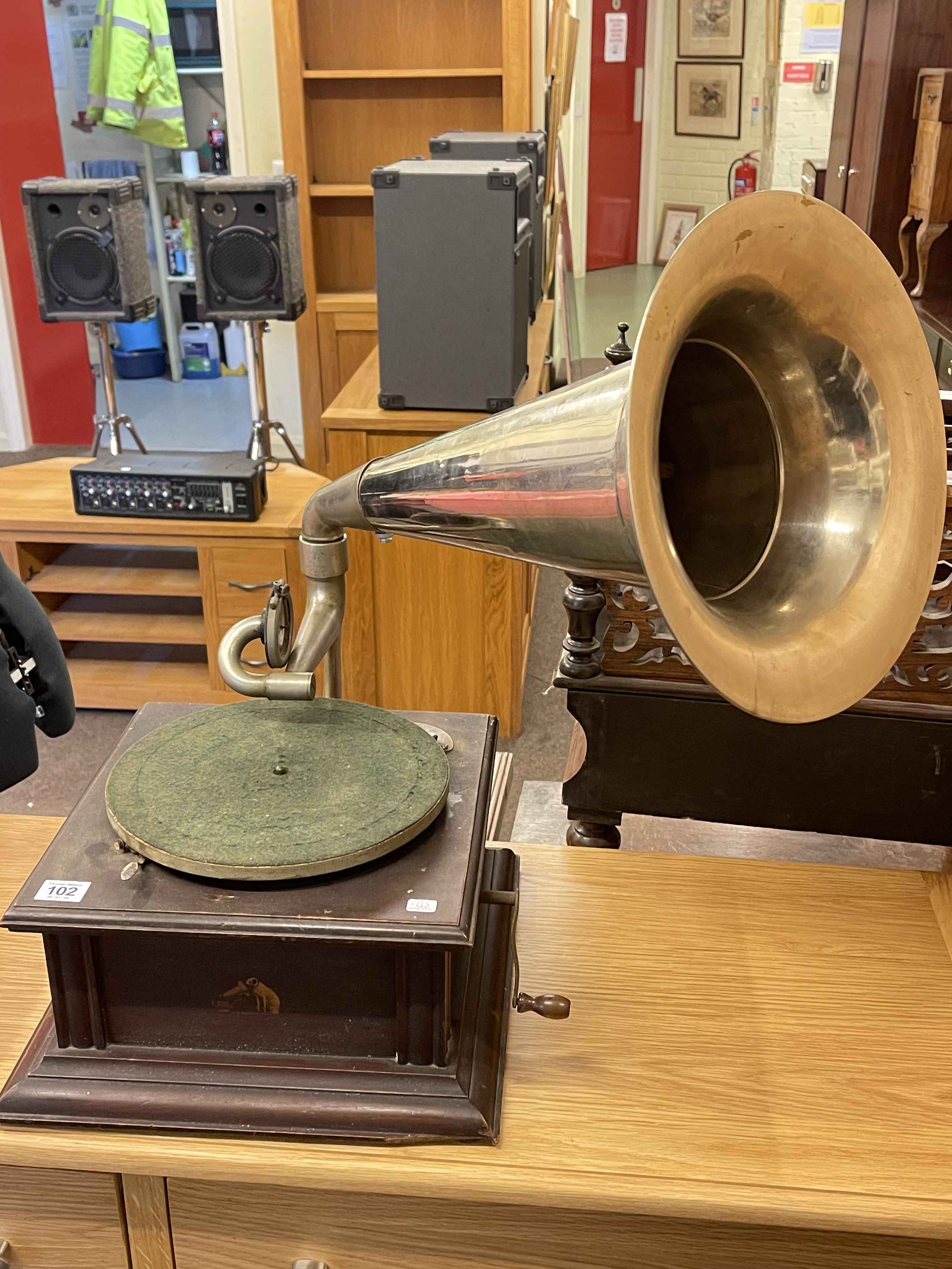 Gramophone with horn marked His Masters Voice.