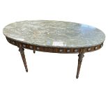 Continental oval marble topped coffee table having roundel decorated frieze, 48.5cm by 109cm by 53.