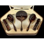 Cased silver and tortoiseshell brush and mirror set, Birmingham 1927.