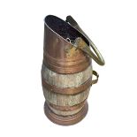 Ornate oak and copper bound coal scuttle, 58cm high.