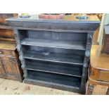 Victorian carved dark oak four tier open bookcase, 123cm by 38cm.