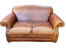 Laura Ashley tan studded leather two seater settee, 157cm.