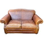 Laura Ashley tan studded leather two seater settee, 157cm.