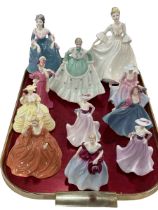 Eleven Coalport figures.