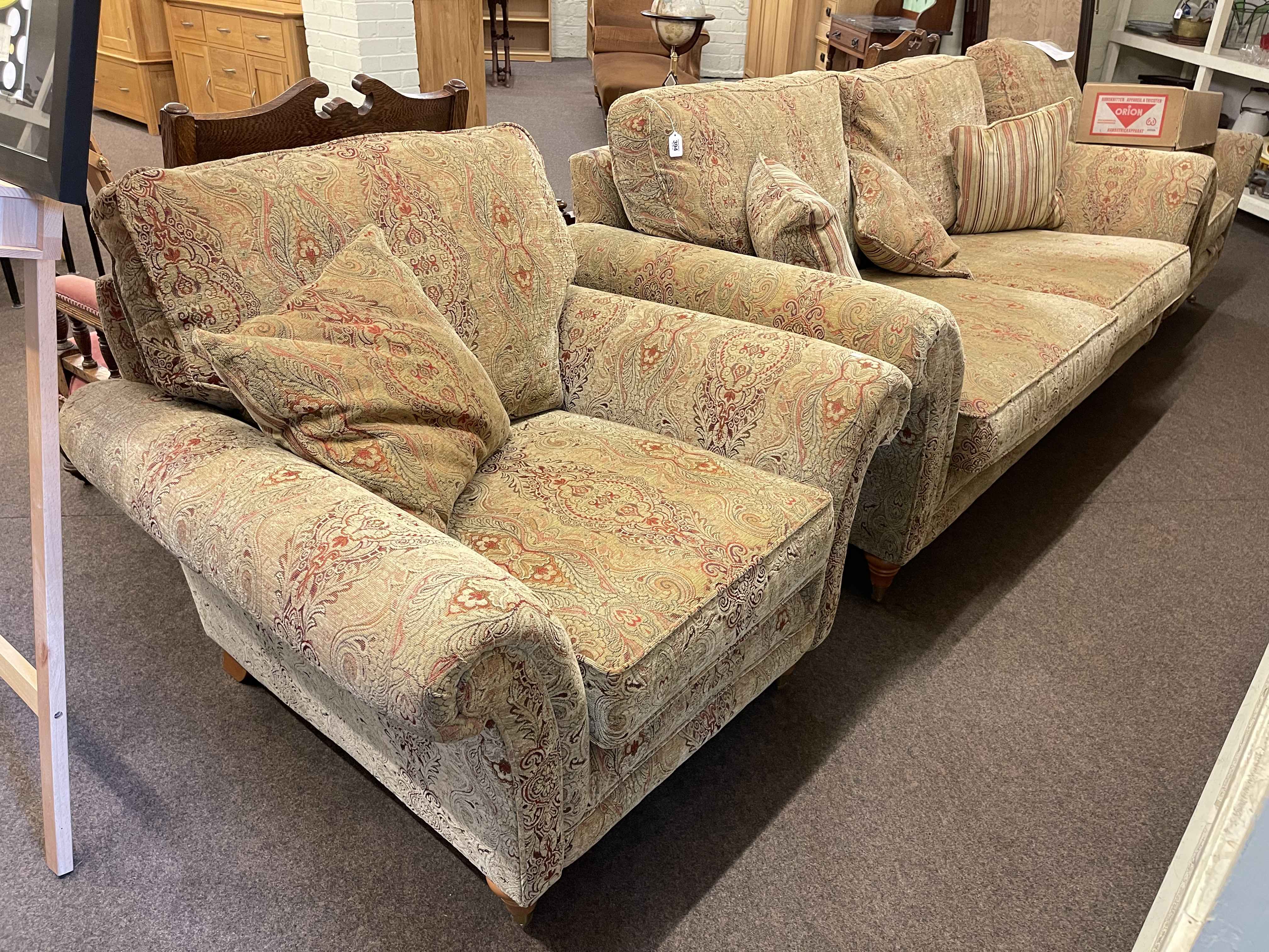 Parker Knoll three piece lounge suite in classical fabric.