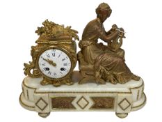 Ornate alabaster and ormolu mantel clock mounted with seated lady, 32cm high.