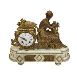 Ornate alabaster and ormolu mantel clock mounted with seated lady, 32cm high.