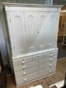 Antique painted oak and pine press having two doors above three short and three long drawers,