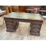 19th Century carved oak partners desk having three frieze drawers above two banks of three drawers