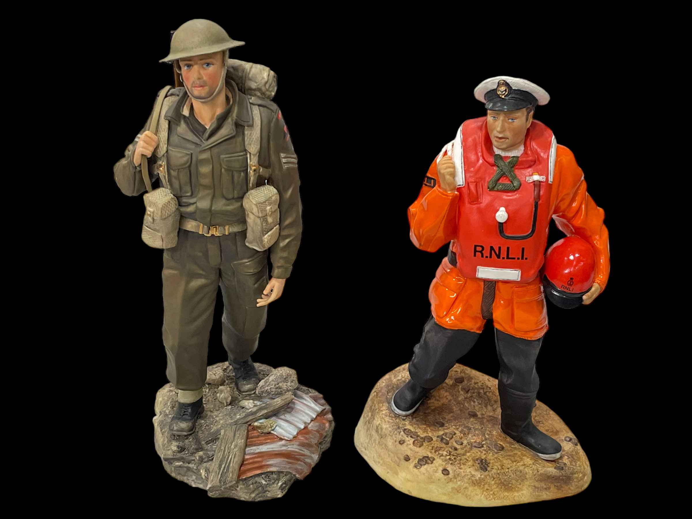 Two Ashmoor figures, RNLI and WWII Infantryman. With boxes.