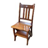 Hardwood metamorphic library chair/steps.