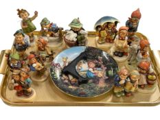 Fourteen Hummel figures and Little Companions plate.