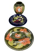 Five pieces of Moorcroft Pottery including Hibiscus.