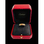 Cartier 18 carat gold and diamond set band ring, signed to interior, purchase date 2015,