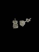 Pair of 18 carat white gold stud diamond earrings.