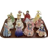 Twelve Royal Doulton figures including Sally, HN2741 and Hazel, HN1797.