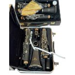 Two clarinets in cases by Osborne Lime and Optimal.