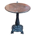 Cast pedestal based circular pub table, 75cm by 64cm diameter.