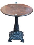 Cast pedestal based circular pub table, 75cm by 64cm diameter.