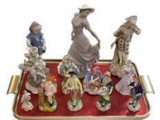 Eight Continental figures, Royal Doulton and Coalport figures, cherub candlestick and Nao lady (12).