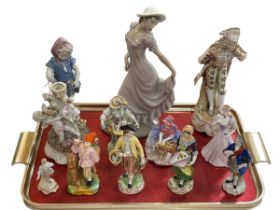 Eight Continental figures, Royal Doulton and Coalport figures, cherub candlestick and Nao lady (12).