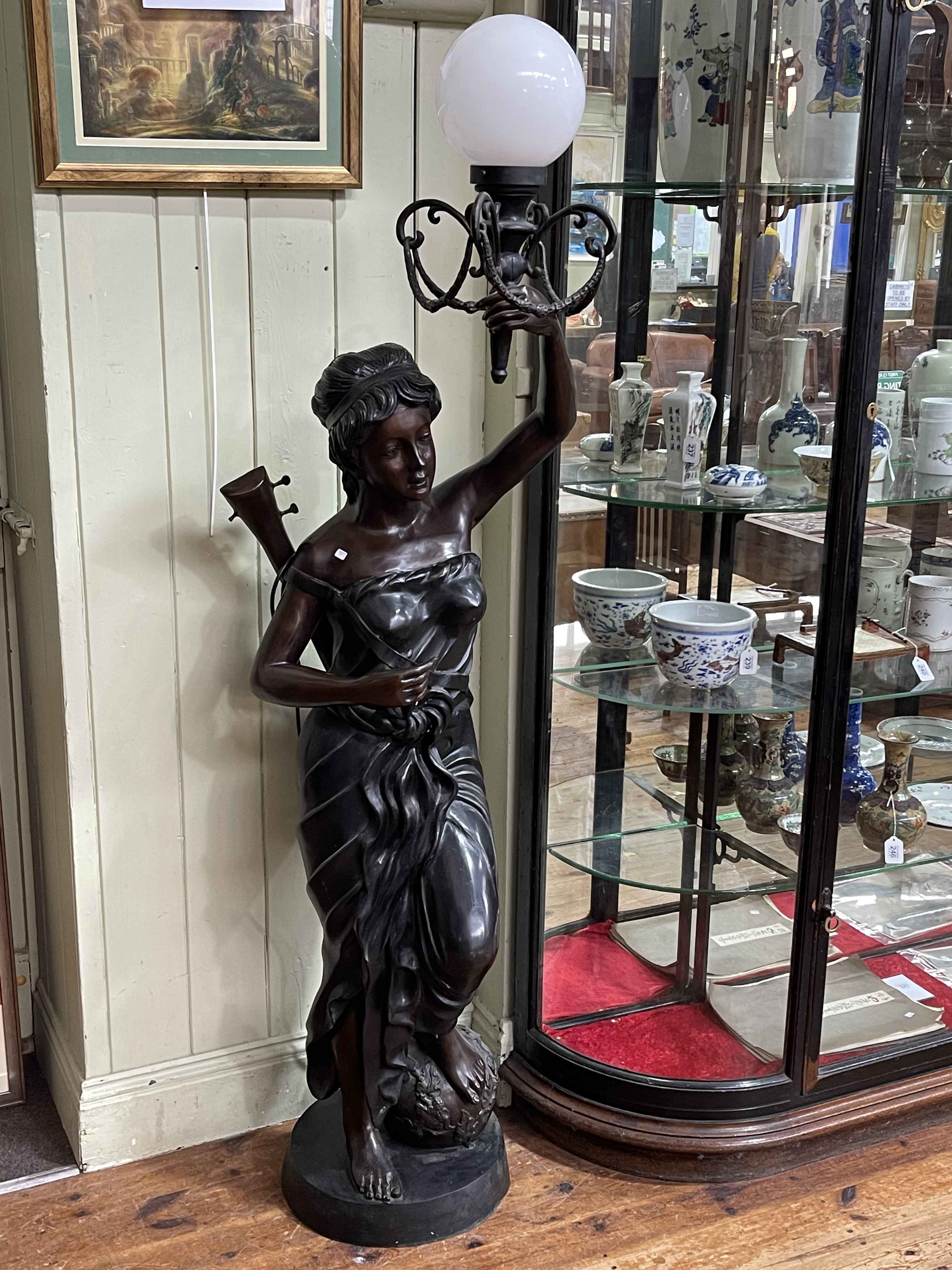 Pair of large bronzed figural floor lamps modelled as lady musicians holding a lamp aloft, 187cm. - Image 3 of 3