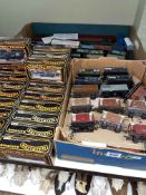 Collection of Mainline, Triang and other wagons including tank wagons, brake wagons, plank wagons,