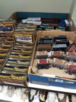 Collection of Mainline, Triang and other wagons including tank wagons, brake wagons, plank wagons,