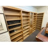 Contemporary five section bookcase unit comprising four open bookcases with adjustable shelves and