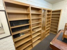 Contemporary five section bookcase unit comprising four open bookcases with adjustable shelves and